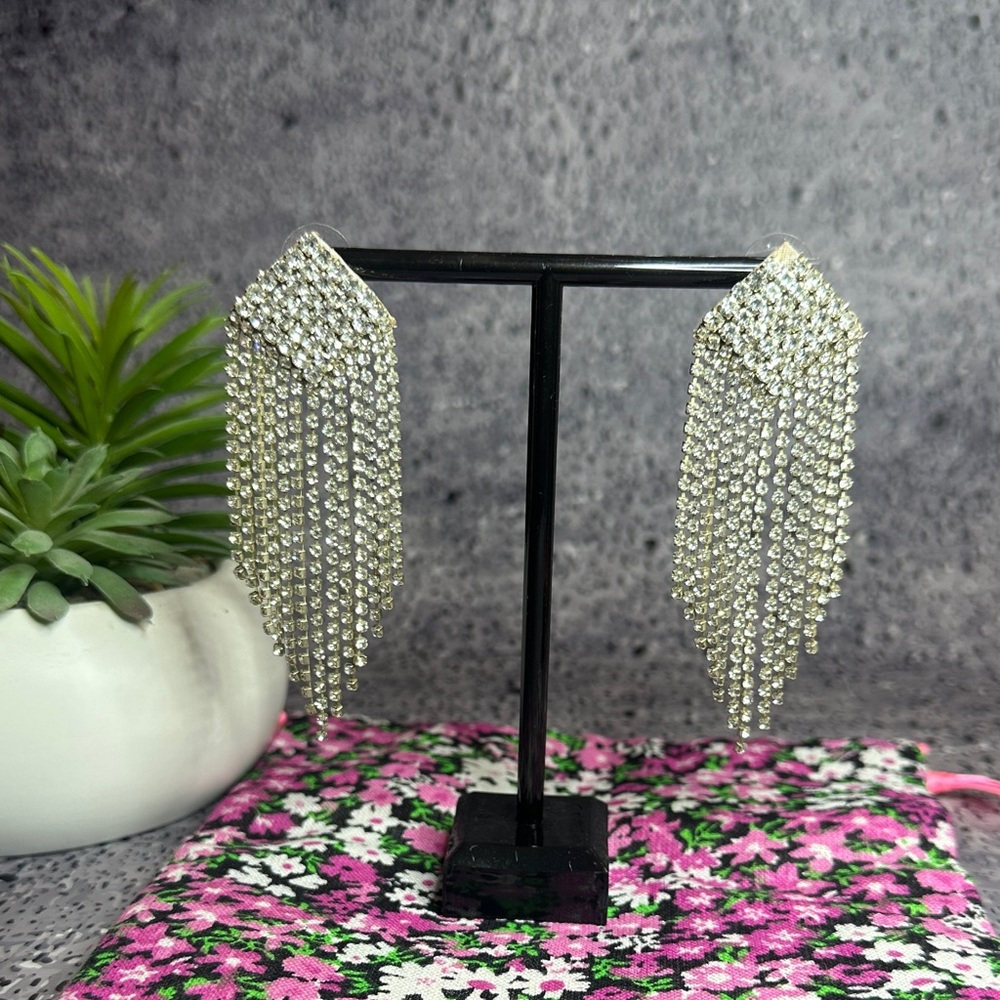 Elegant Silver Dangle Earrings by Deepa Gurnani. So sparkly!